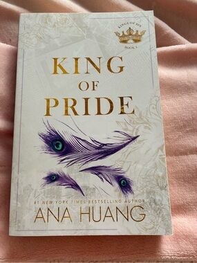 King of Pride by Ana Huang – White Cover with Purple Peacock Feathers